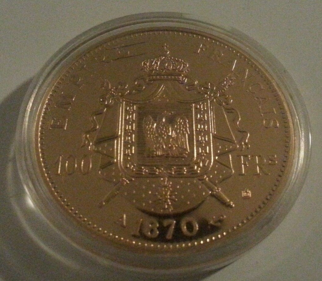 Napoléon 100 francs 1870 (or~) à 251 euros..JPG