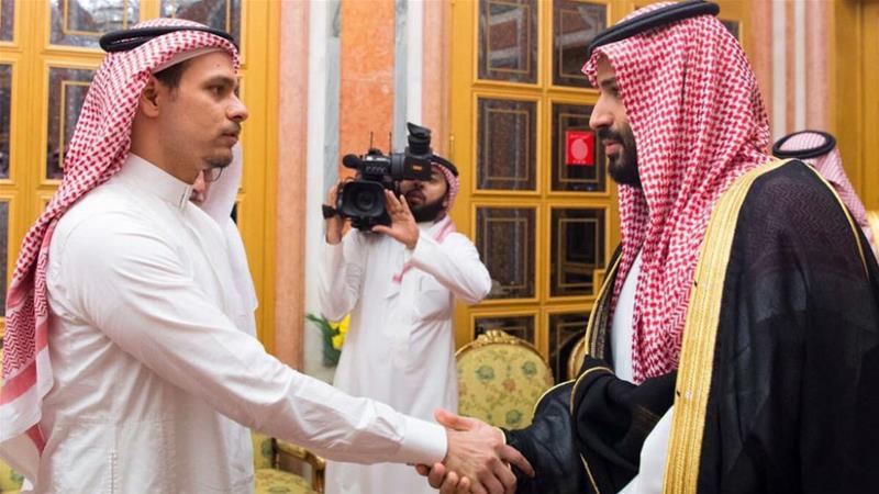 Salah Khashoggi shakes hands with Crown Prince Mohammed bin Salman after being 'invited' to receive condolences.jpg